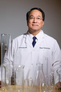 Joe Chang with beakers